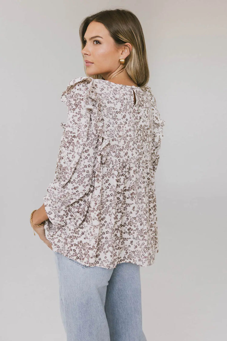 Ruffled top in cream