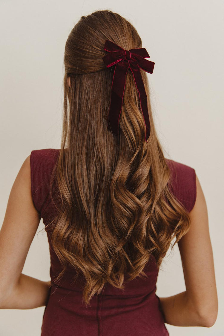 Velvet bow in wine color