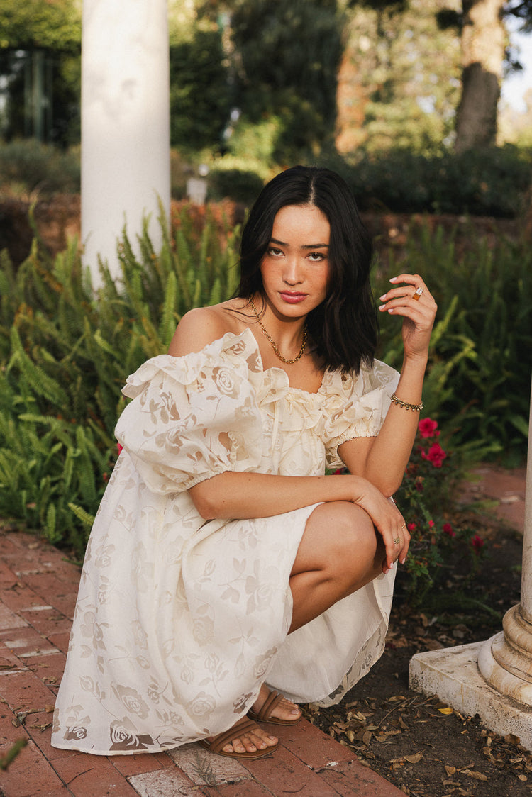 Off shoulder dress in ivory