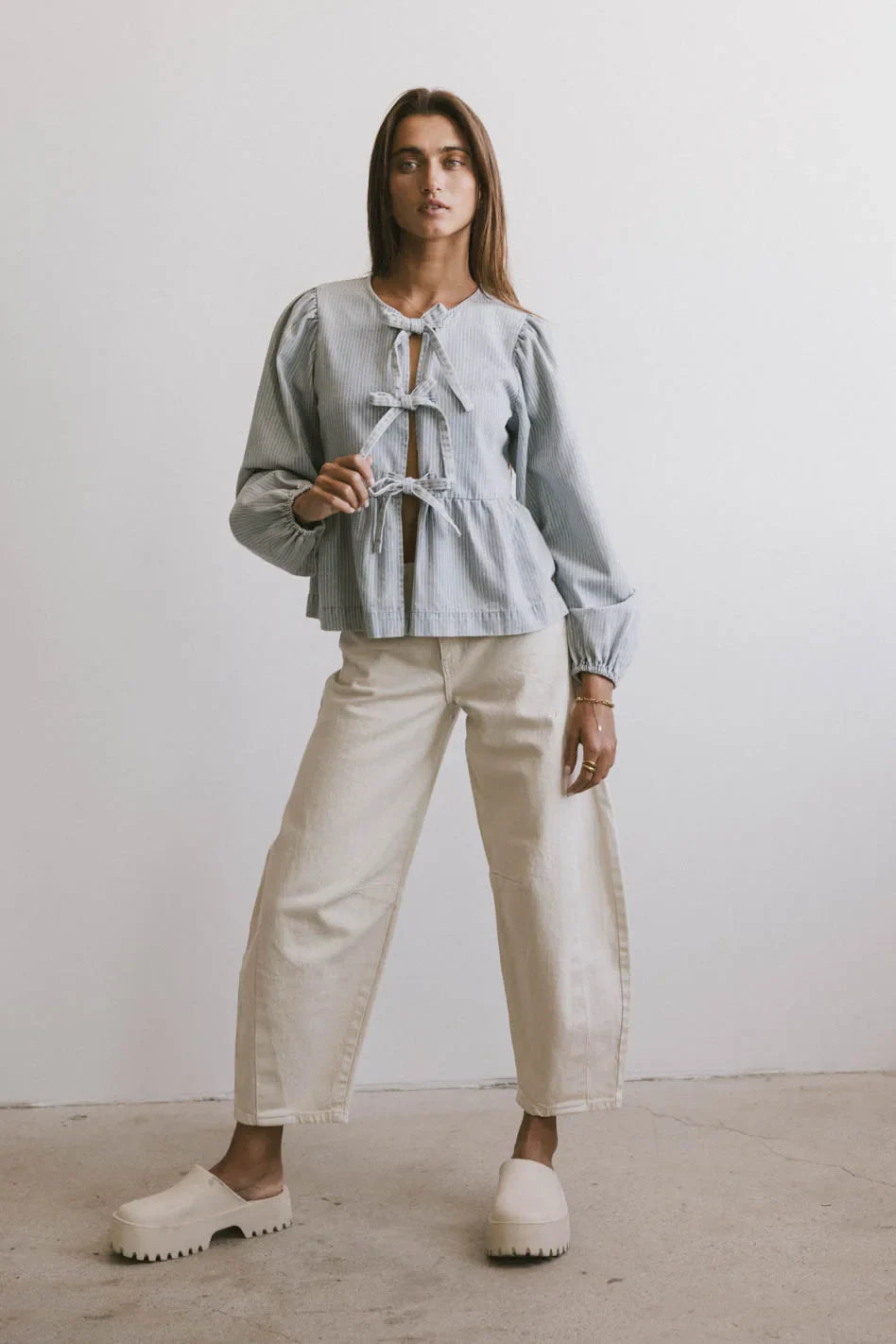 Peplum top in light wash