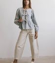 Peplum top in light wash