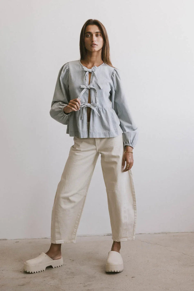 Peplum top in light wash