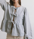 Three ties top in light wash