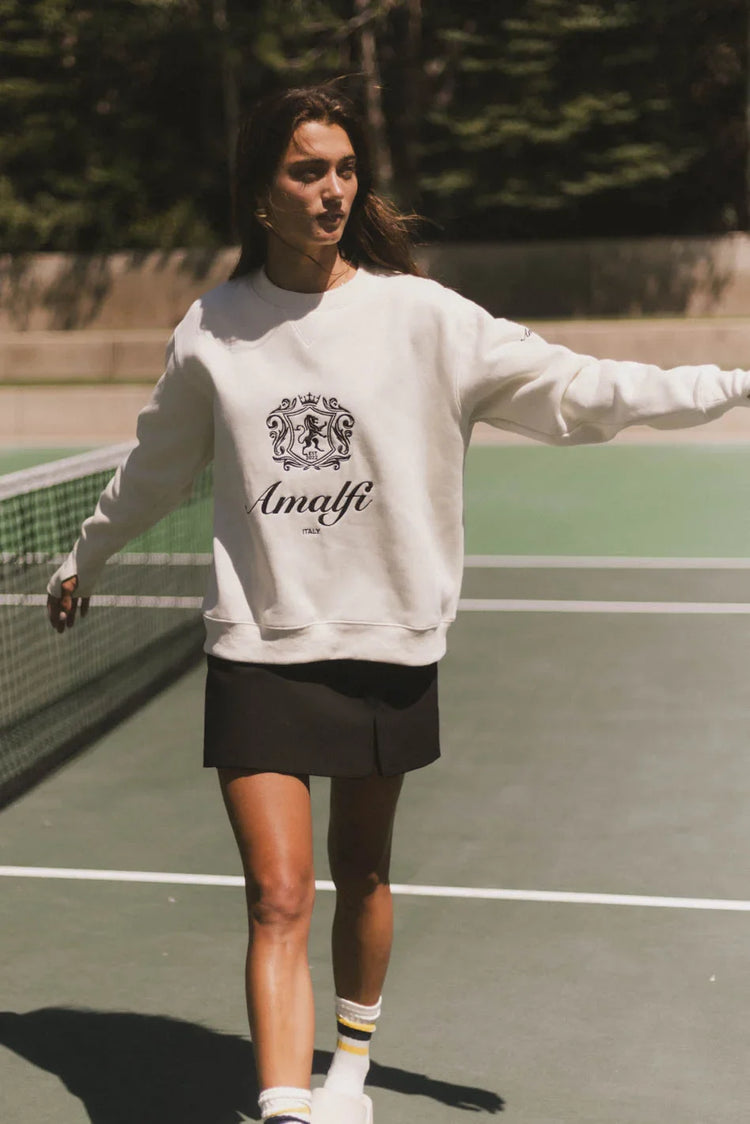Round neck sweater in cream