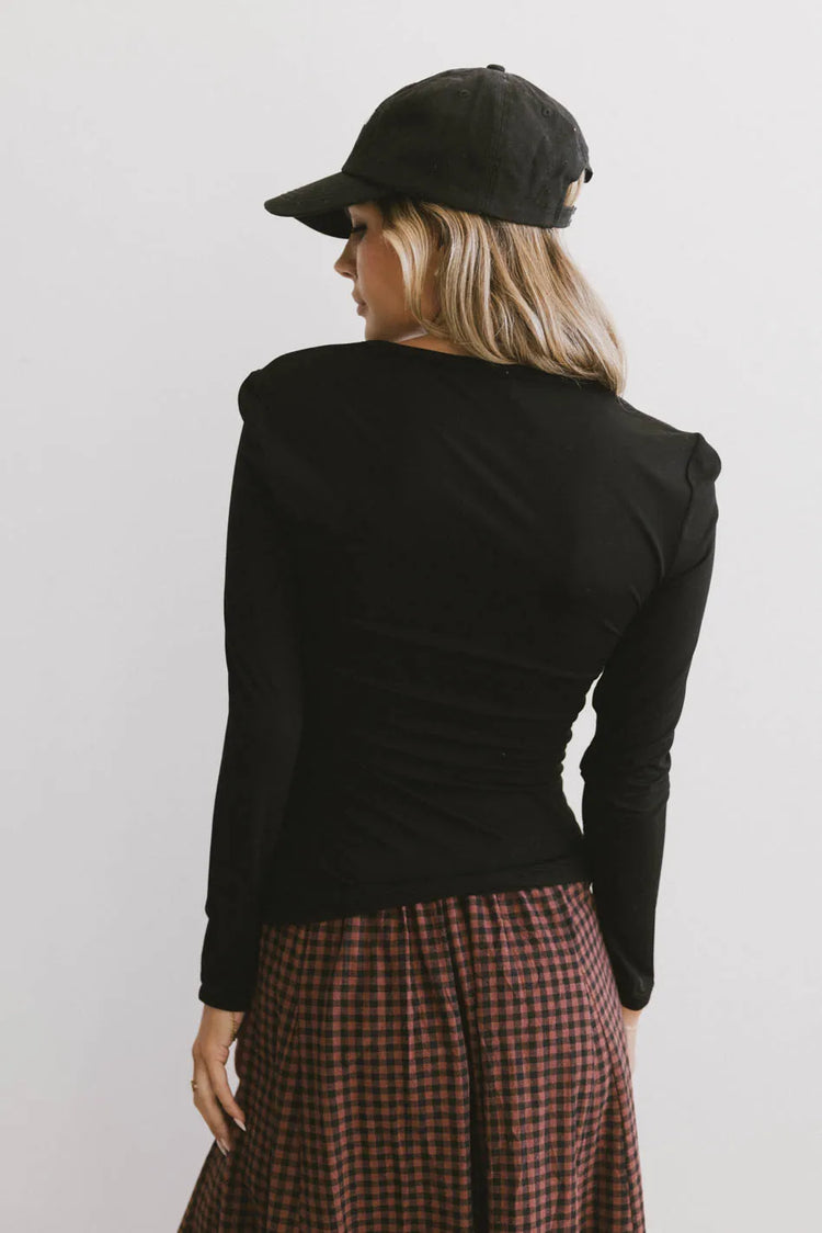 Plain color top in black