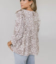 Ruffled top in cream