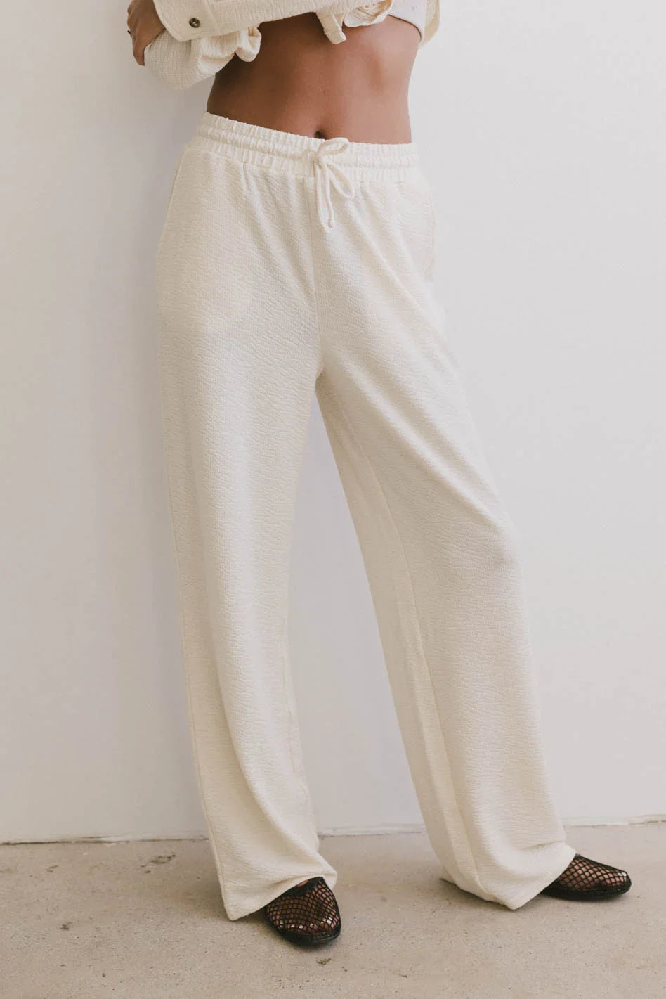 Elastic waist pants in cream