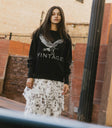 bird long sleeve sweater in black