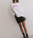 red ribbon sweater