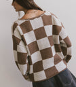 brown and white checker sweater