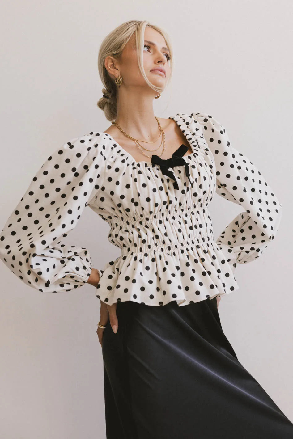Polka dots top in cream