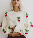 Round neck sweater in cream