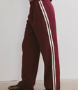 Two white straps on the side pants in burgundy