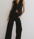 Top paired with a wide leg pants