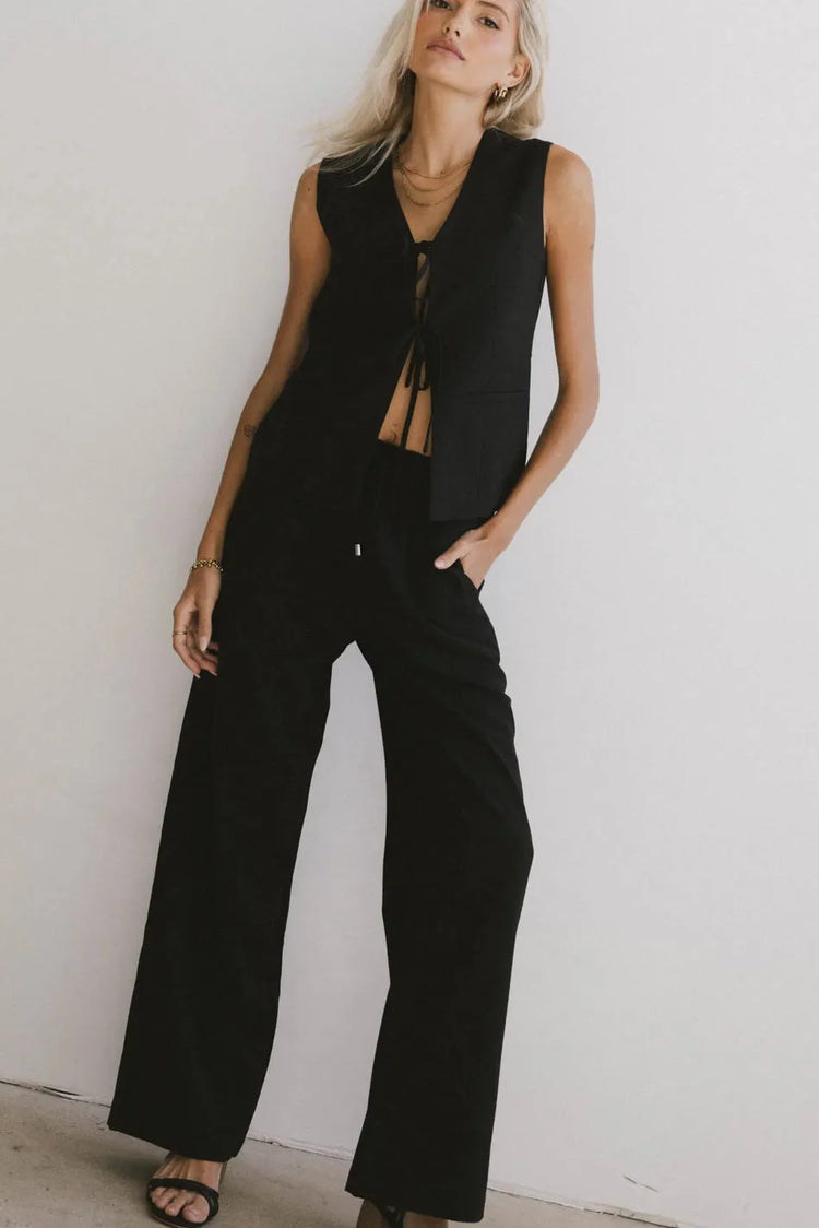 Top paired with a wide leg pants