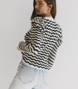 Black and cream sweater