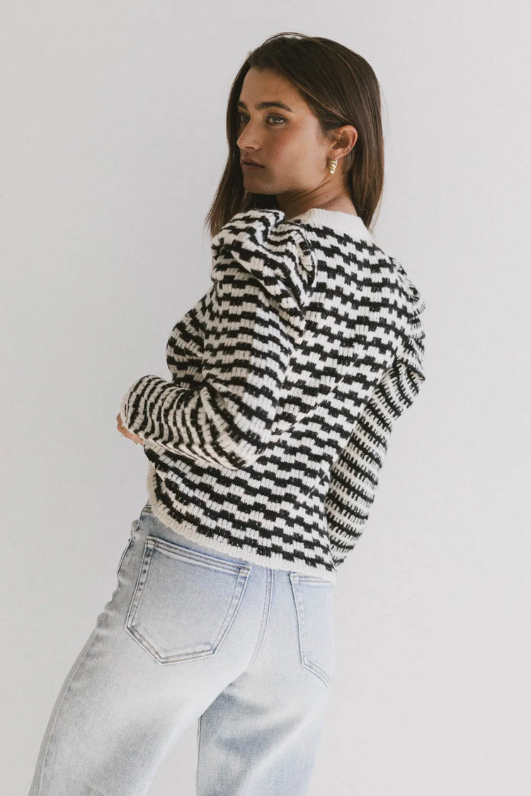 Black and cream sweater