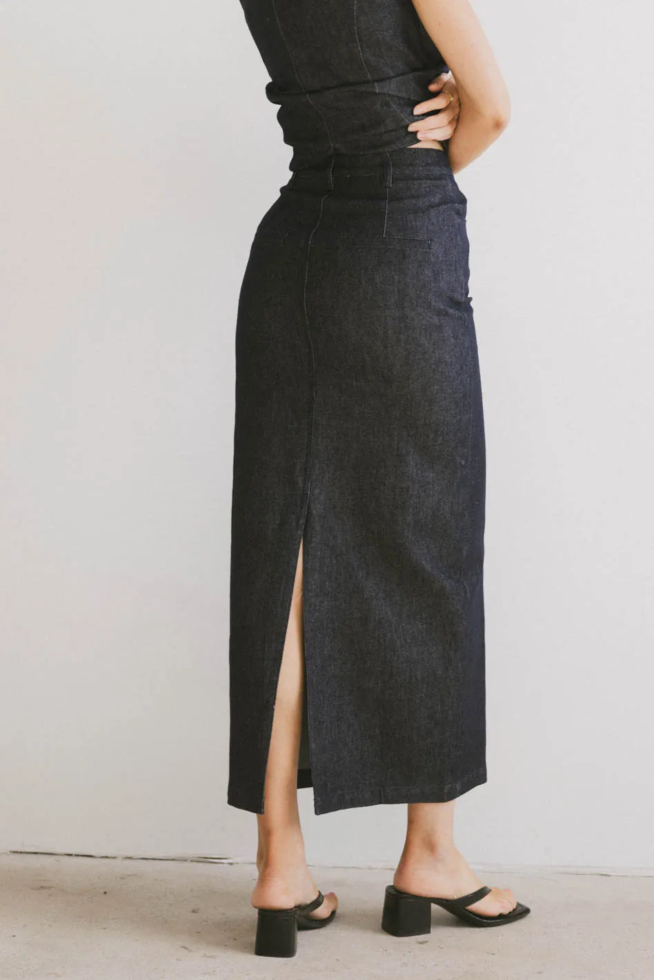 Slit opened denim skirt in dark wash