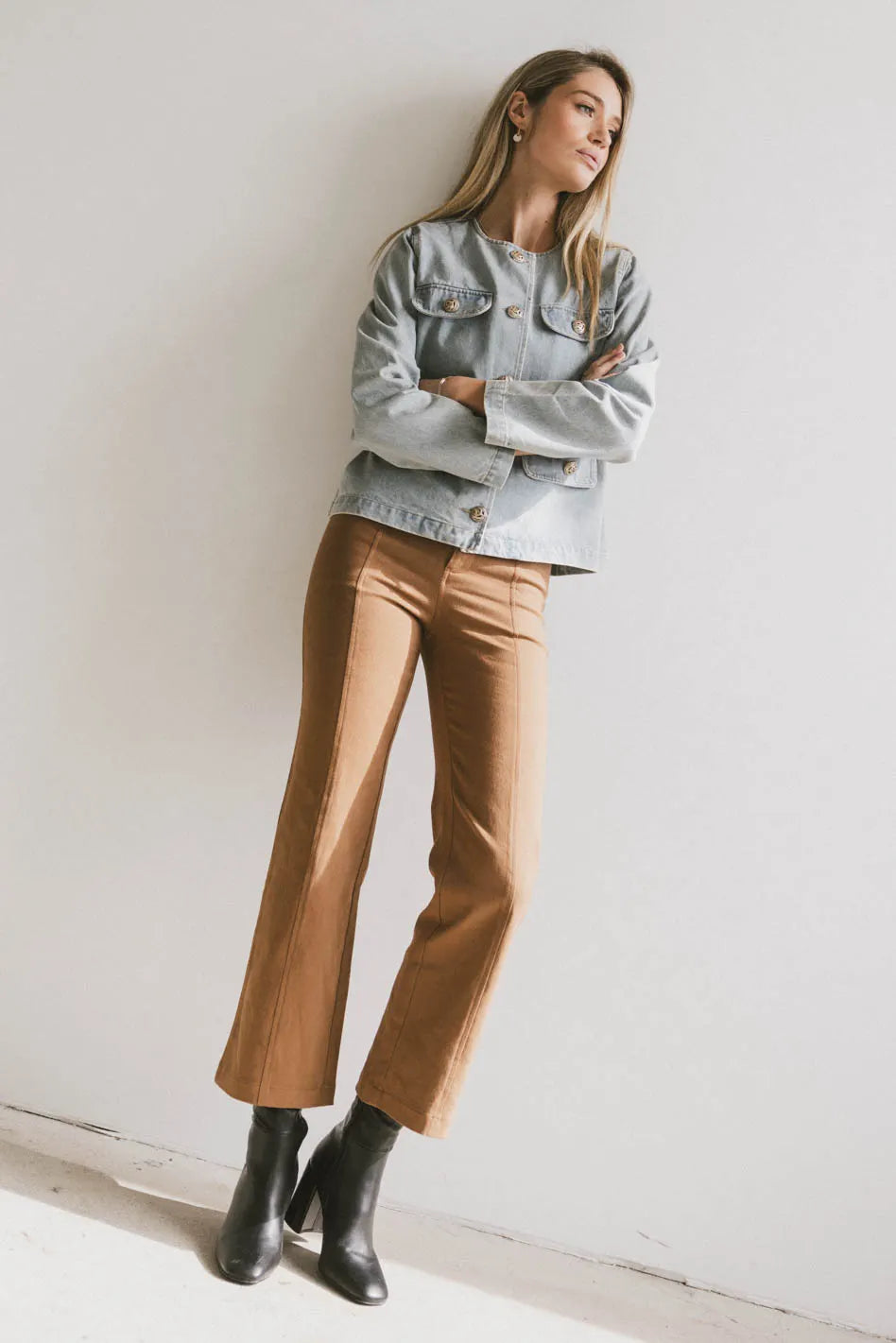 Pants in camel paired with a denim top