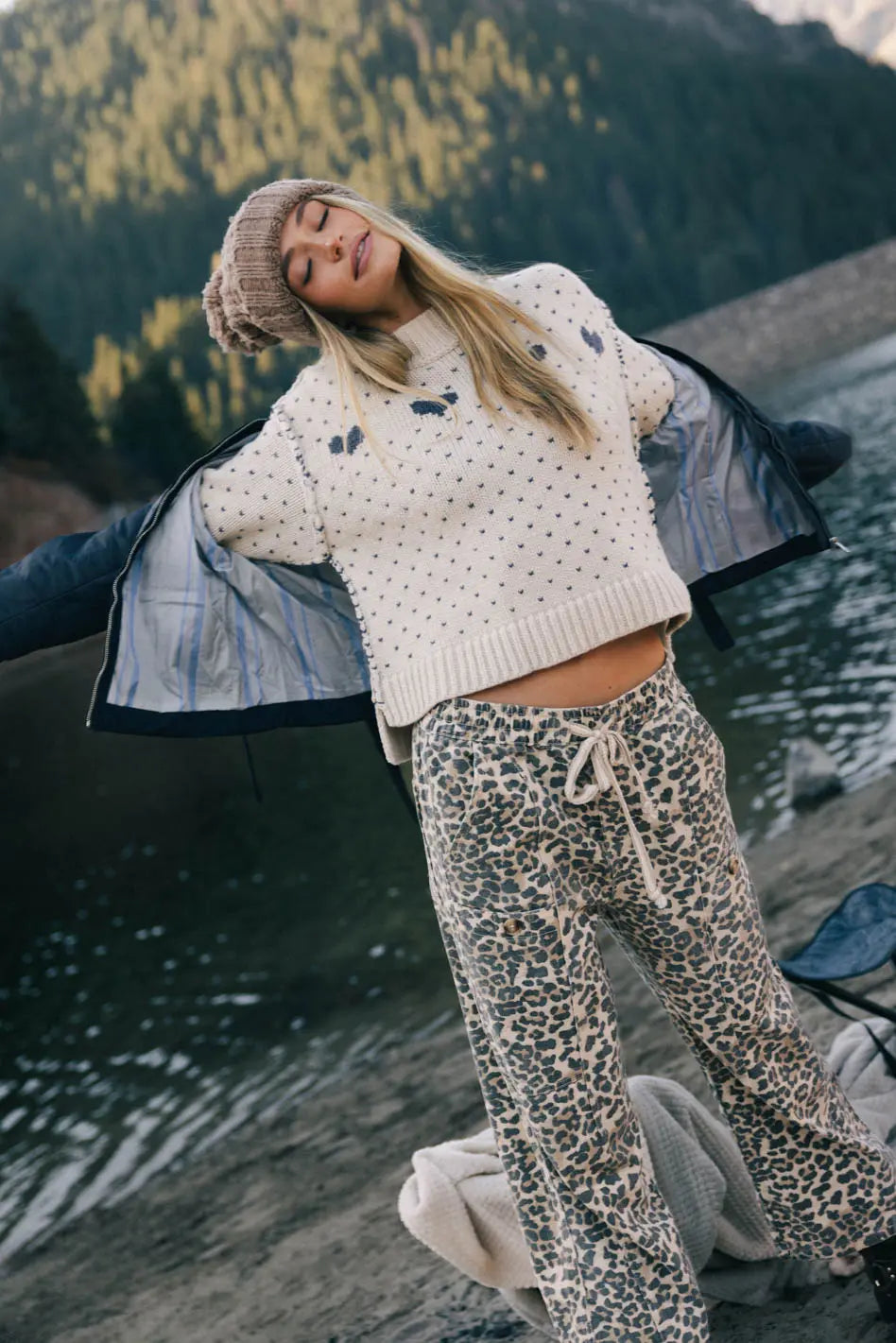Knit sweater in natural with navy blue design