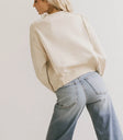 Plain color top in natural
