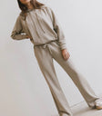 Hoodie in taupe paired with pants in taupe