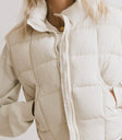 beige puffer vest with zipper