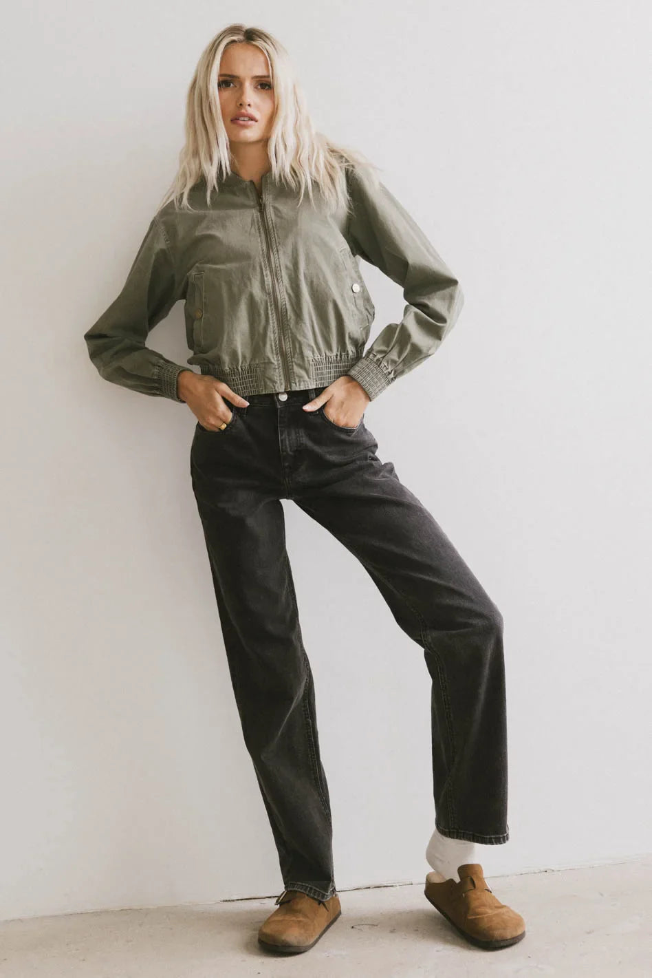 Bomber jacket paired with a black denim