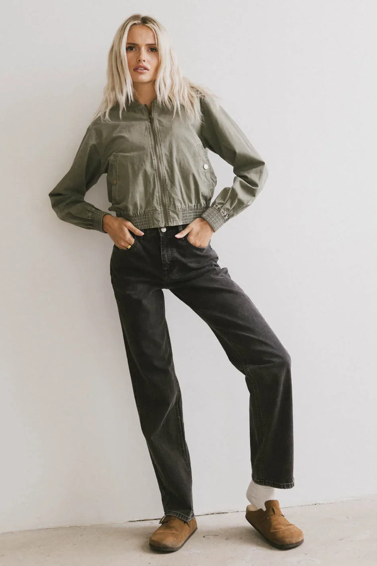 Bomber jacket paired with a black denim