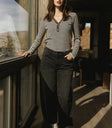 Striped to in black paired with denim
