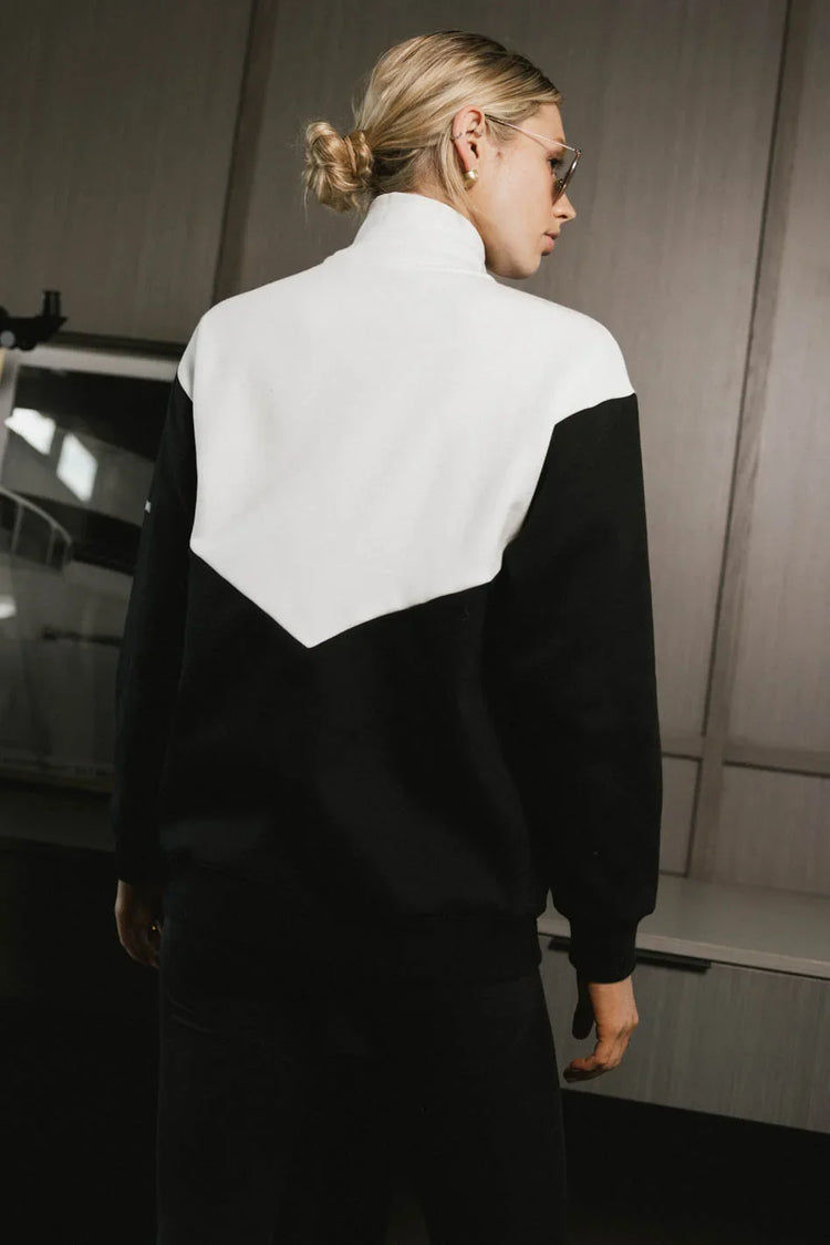 Block color sweater in black and white