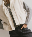 Sleeveless vest in cream