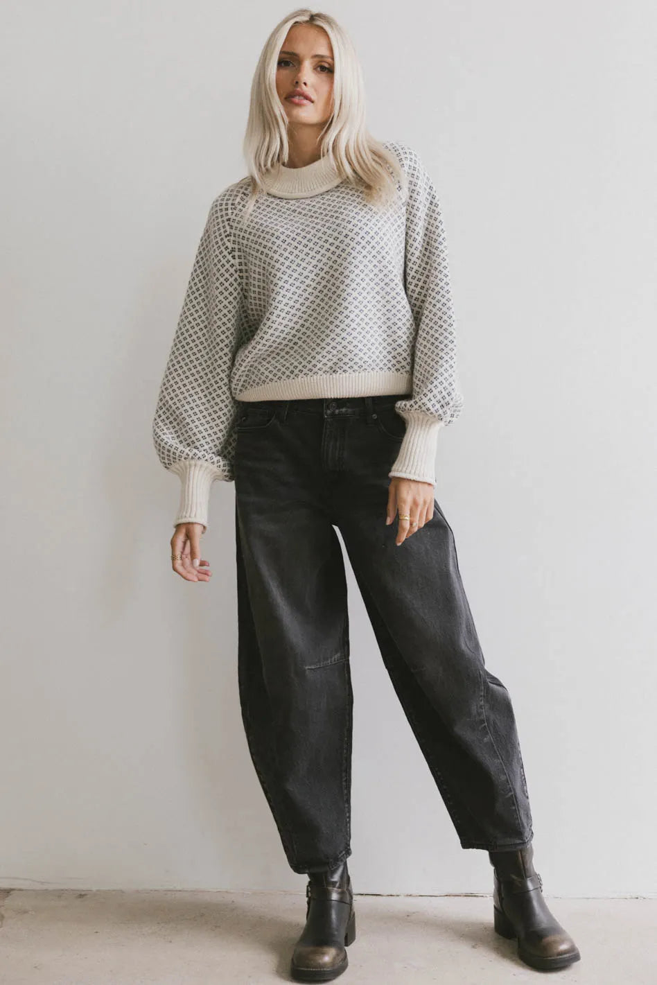 Sweater in ivory paired with a black denim