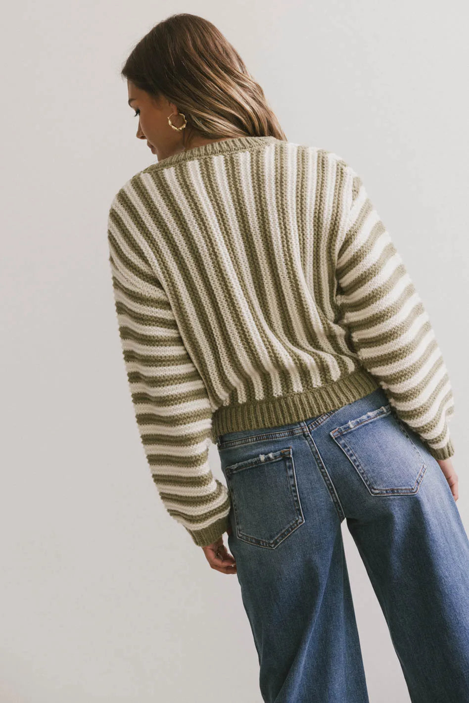 Knit striped sweater in moss