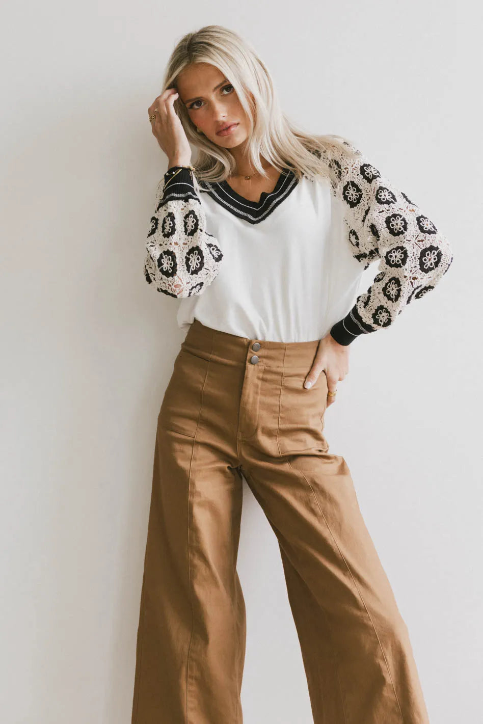 Crocheted embroidered top in white