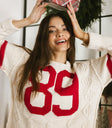 Round neck sweater in cream