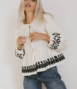 Front tie blouse in cream
