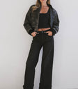 black bomber with black denim
