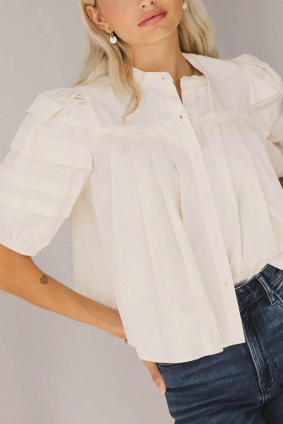 Pleated blouse in cream