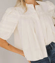 Pleated blouse in cream