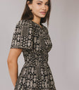 black printed dress with smocked waist