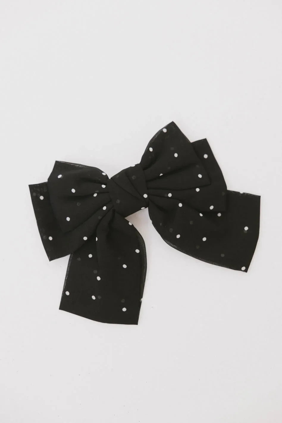 Polka dot bow in black