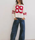 Long sleeves sweater with red details