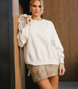 Round neck sweater in cream