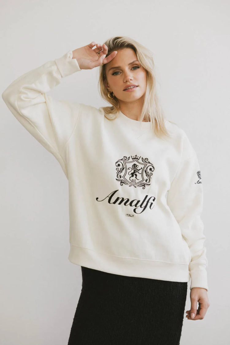 Round neck sweater in cream