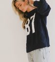 navy cable knit sweater