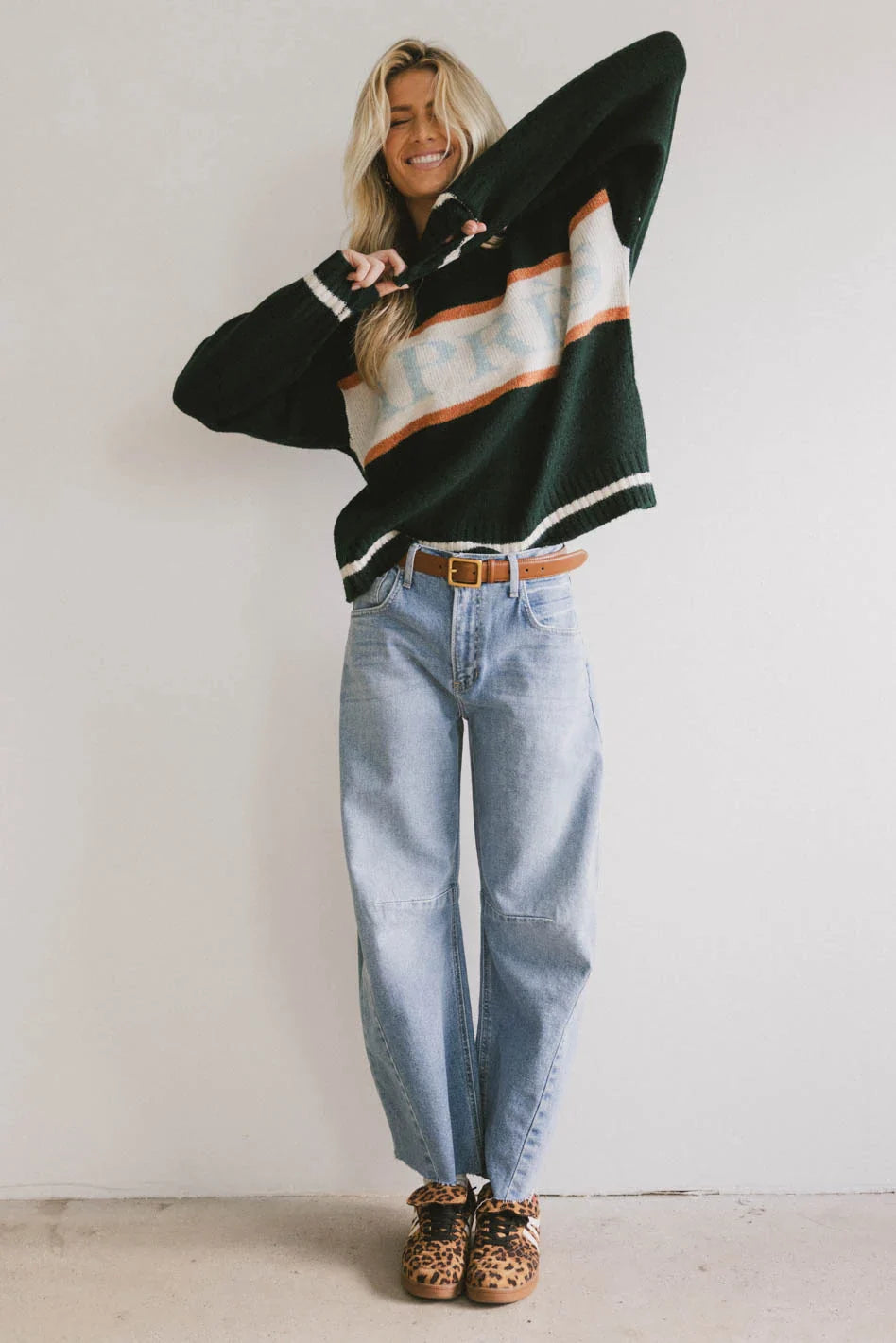 dark green sweater