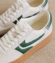 Green platform sneakers