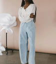Embroidered denim pants in light wash