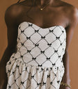 Sleeveless bow dress in cream